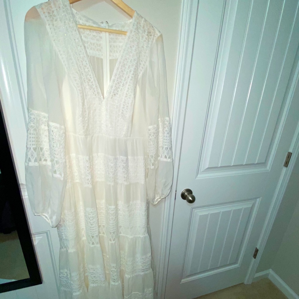 Embroidered floral lace gown.